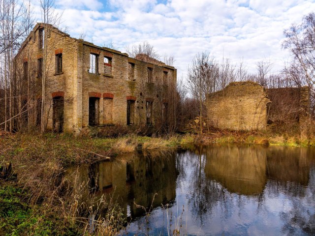 Abandoned home next to pond near Aa, Estonia