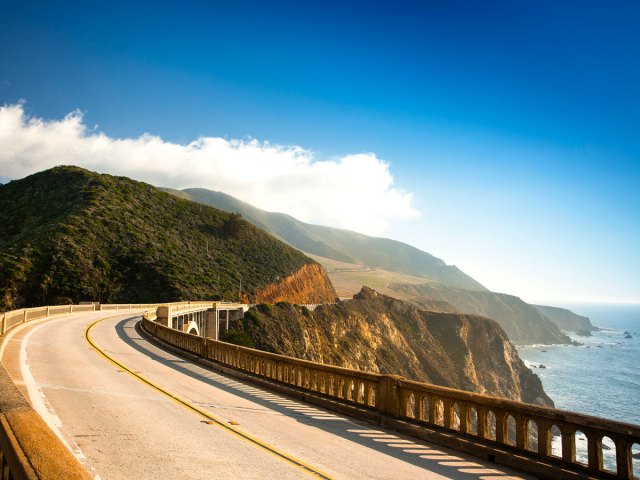 Pacific Coast Highway stretching along cliffs of Big Sur, California