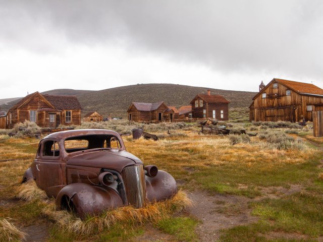 Abandoned car and buildings in Bodie, California