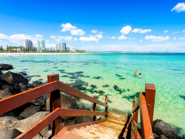 Stairs leading to translucent waters off the Gold Coast of Australia 