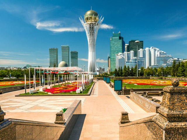 Gardens and distinctive gold-domed building in Astana, Kazakhstan