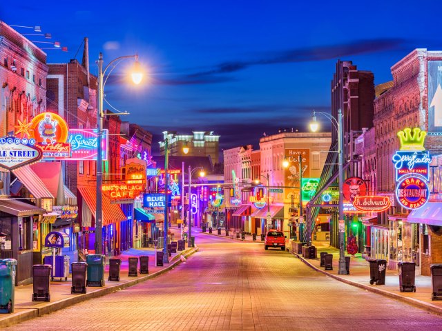Beale Street lit by neon signs in Memphis, Tennessee