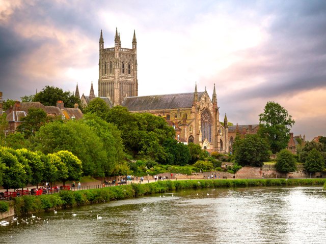 Church along river in Worcester, England