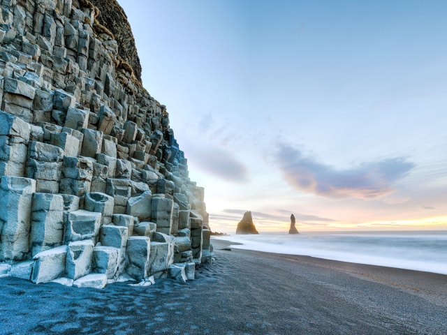 Stacked rock formations along Reynisfjara beach in Iceland