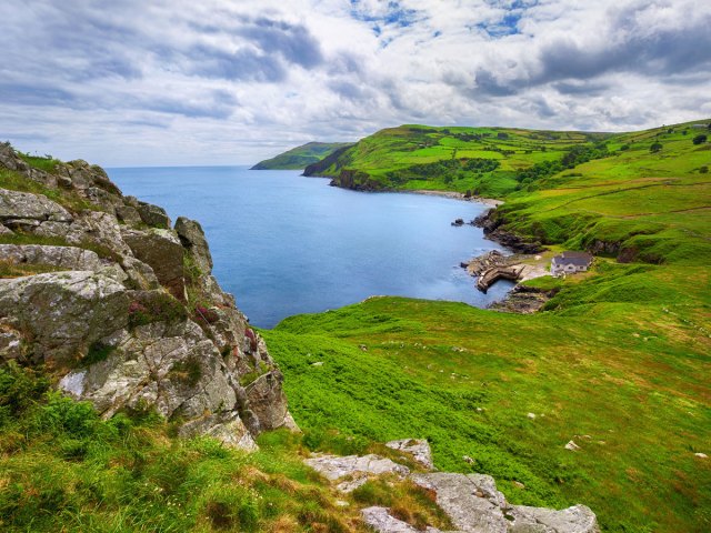 Lush green landscapes of the Antrim Coast in Northern Ireland