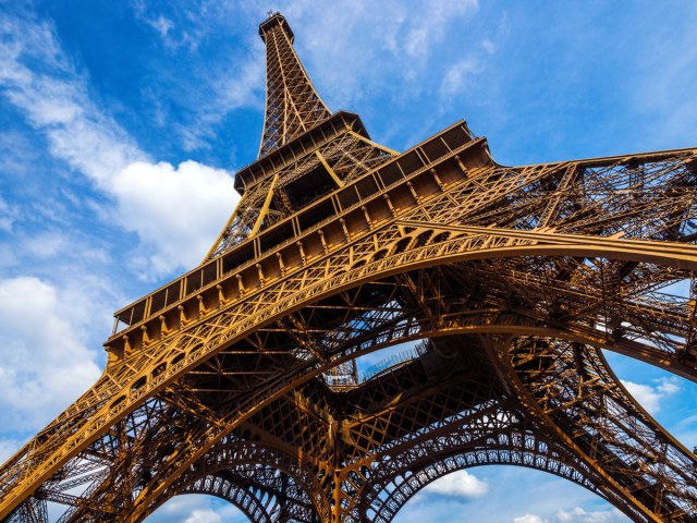 View from base of Eiffel Tower to tip in Paris, France