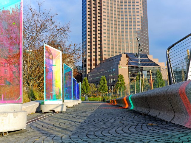 Art display on bridge leading toward skyscraper in Cleveland, Ohio