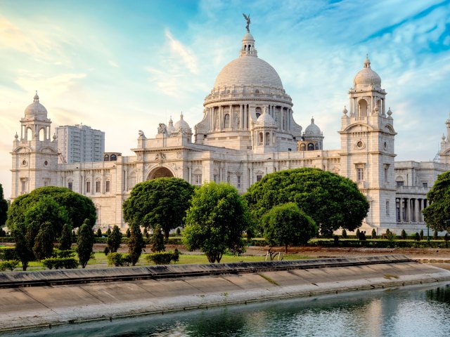View of Victoria Memorial across river in Kolkata, India