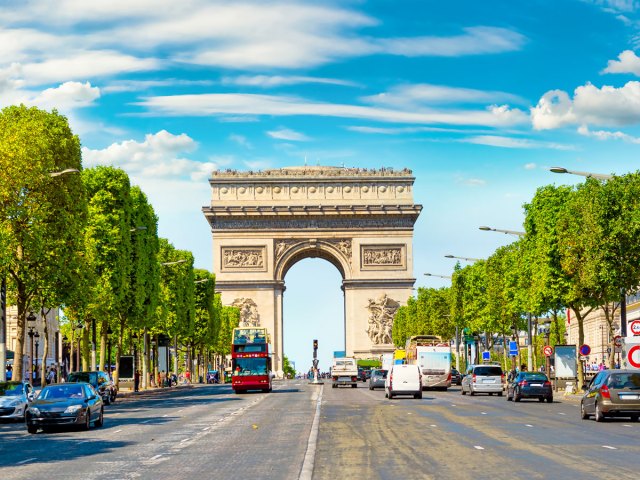 Looking down Champs Élysées in Paris, France, towards Arc de Triomphe
