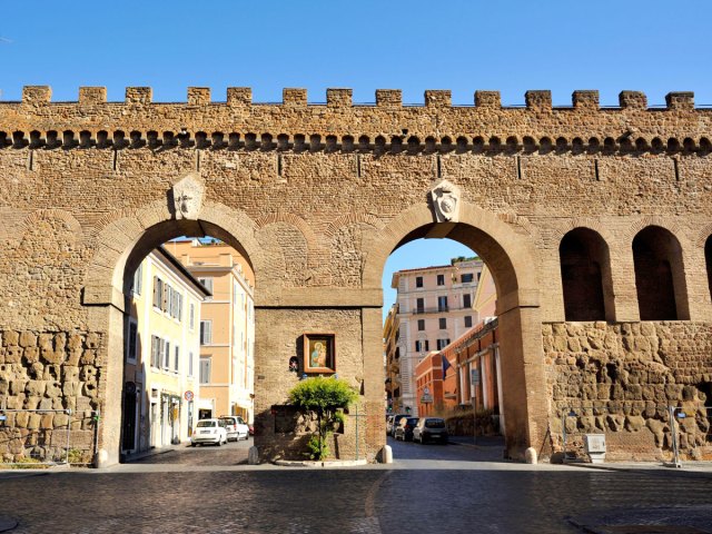 Stone archway concealing the Passetto di Borgo in Vatican City