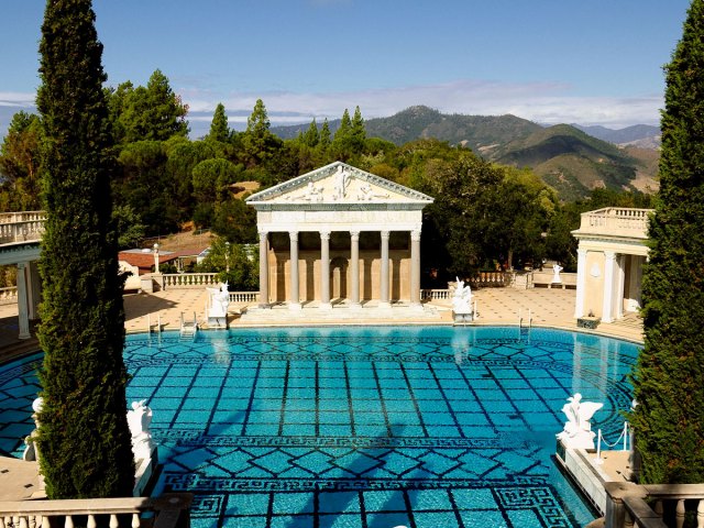 Roman pool at Hearst Castle with hills of San Simeon, California, in the distance