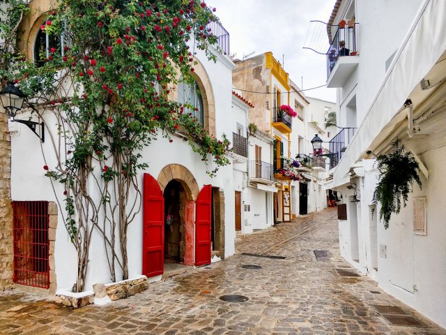 Cobblestone alleyway in Ibiza, Spain