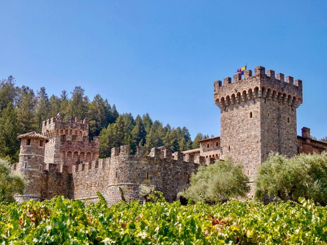 Castello di Amorosa surrounded by vineyards in Napa Valley, California