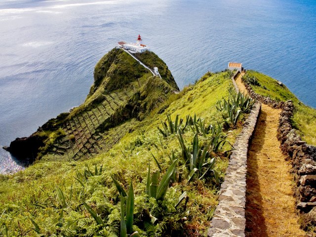 View from clifftop of a lighthouse on Santa Maria island in the Azores