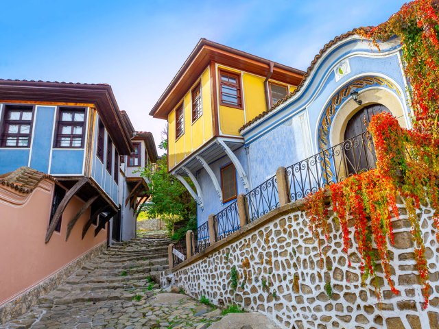 Staircase between colorfully painted homes in Bulgaria