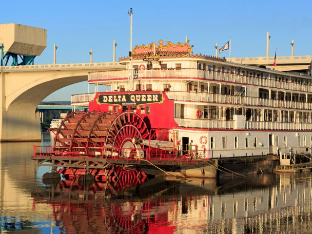 The Delta Queen steamboat docked in river