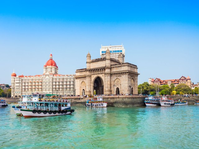 Gateway of India monument seen across Mumbai Harbor