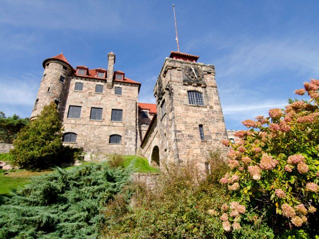 Stone facade of the Singer Castle in New York