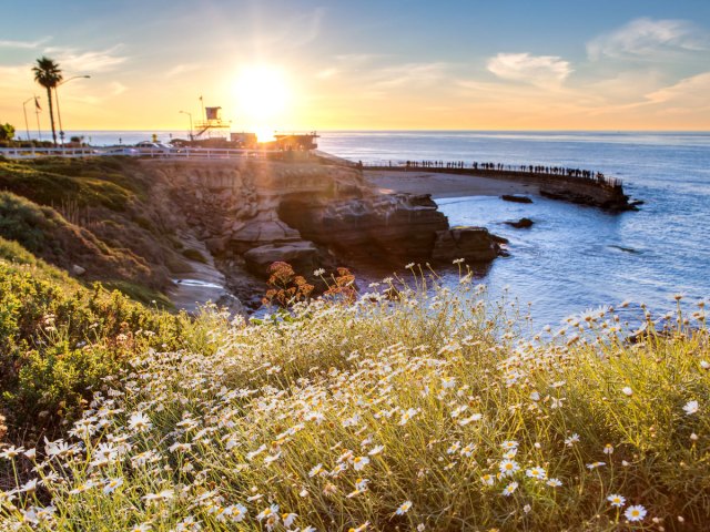 Sun setting over cliffs in La Jolla, California