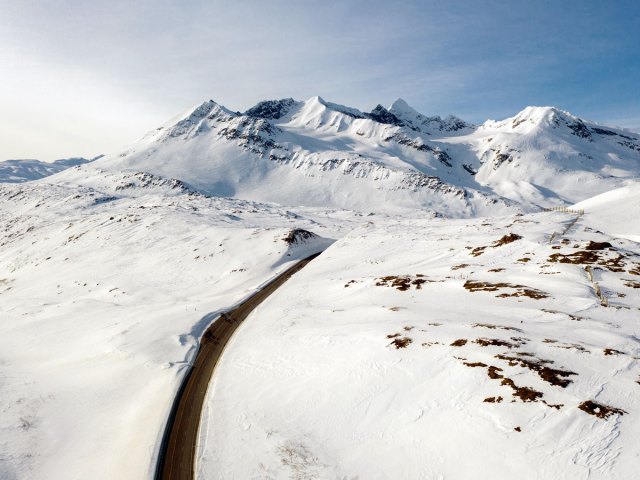 Aerial view of snow-covered Thompson Pass, Alaska