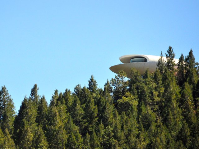 The Sculptured House poking out above the trees in Genesee, Colorado