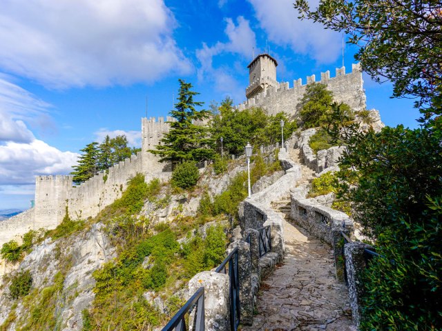 Stone pathway leading to hilltop fortress in San Marino