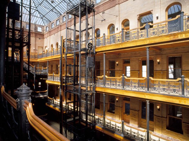 Light-filled interior courtyard of the iconic Bradbury Building in Los Angeles, California