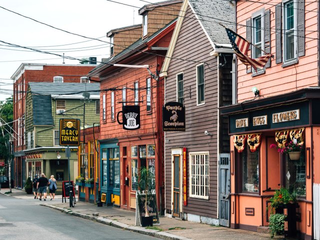 Street lined with storefronts in Salem, Massachusetts