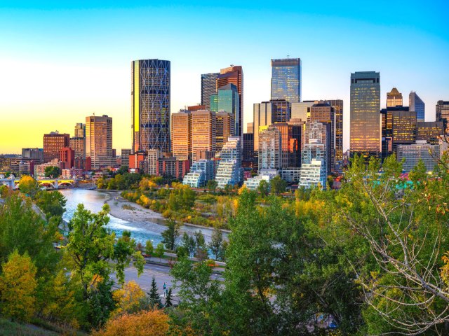 Sunset above Bow River and Calgary skyline in Alberta, Canada