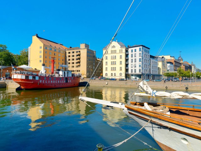 Ships in marina and apartment buildings in Helsinki, Finland
