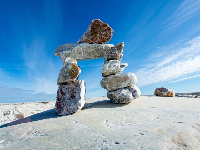 Inukshuk rock sculpture on Marble Island in Canada's Nunavut Territory