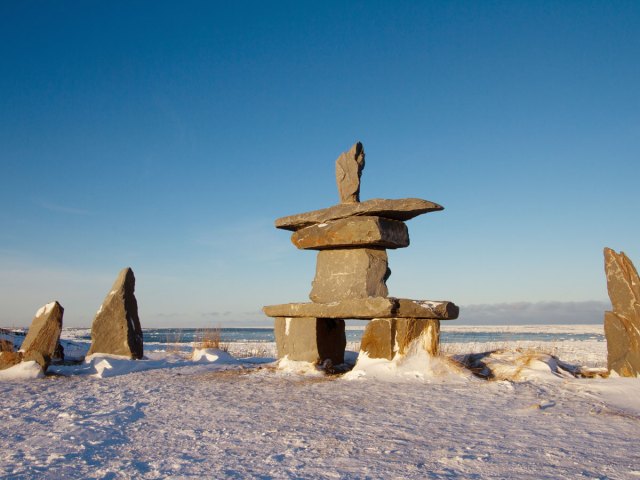 Rock formations on icy landscape in Manitoba, Canada