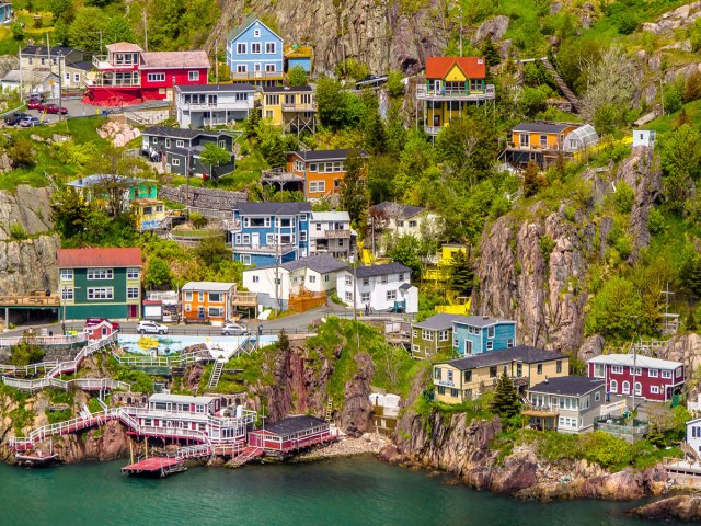 Aerial view of colorful houses on rocky slope of Signal Hill in St. John's, Newfoundland