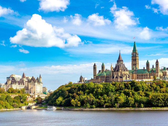 View of Parliament Hill across Ottawa River in Ottawa, Ontario, Canada
