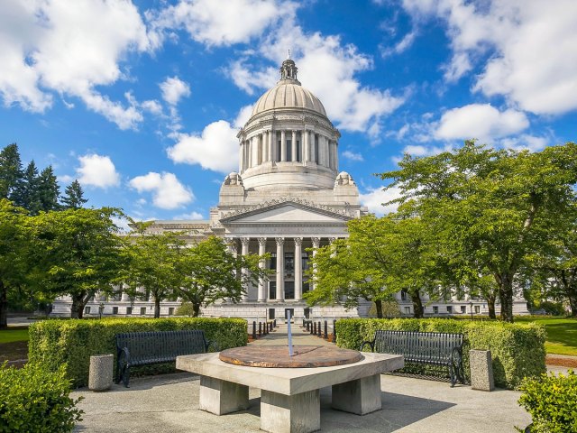 Monument and benches in front of Washington State Capitol in Olympia