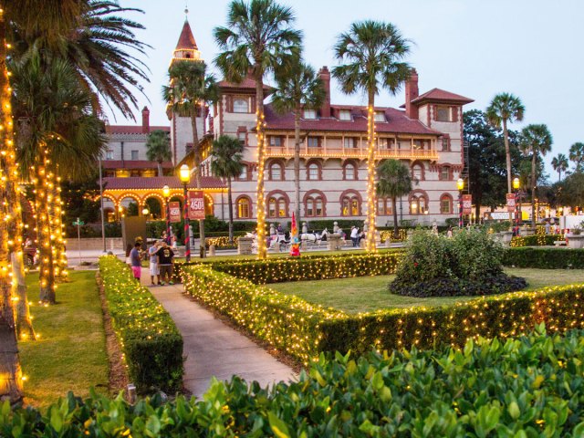 Garden and mansion decorated with holiday lights in St. Augustine, Florida