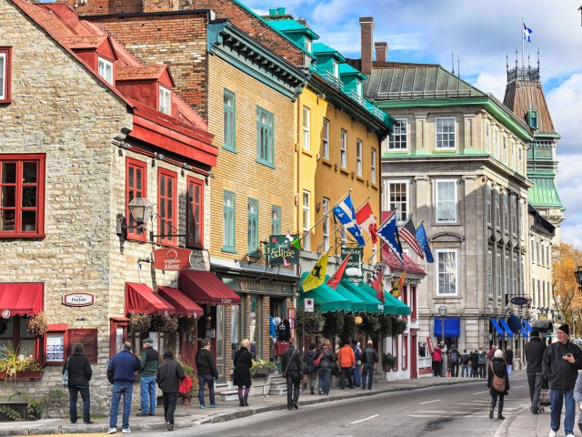 People walking along shops and restaurants of Old Quebec City, Quebec, Canada