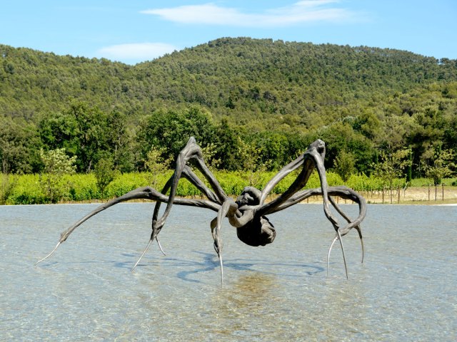 Giant spider sculpture in lake at France's Château La Coste