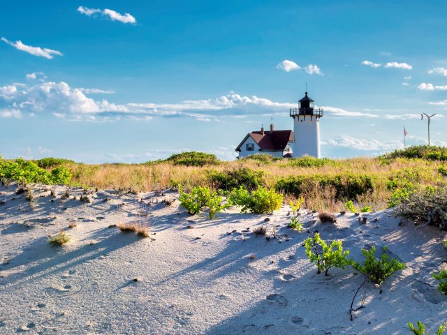 Lighthouse on sandy beach in Cape Cod, Massachusetts