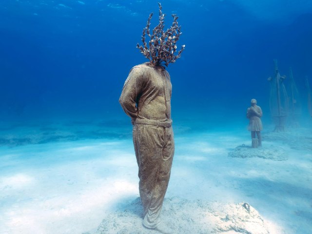 Sculptures resting on seabed floor at Museum of Underwater Sculpture in Cyprus