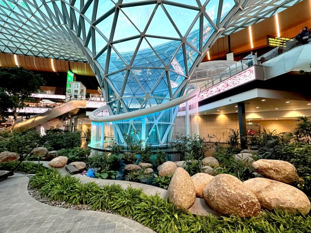 Garden and water feature inside Hamad International Airport in Doha, Qatar