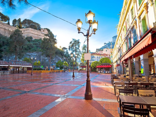 Empty tables along plaza in Monaco