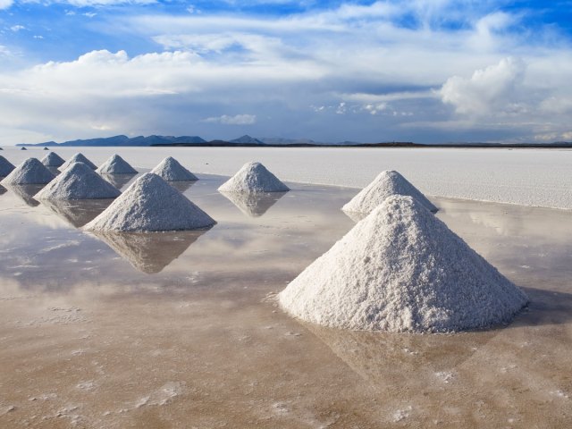 Small, conical white salt dunes in Bolivia