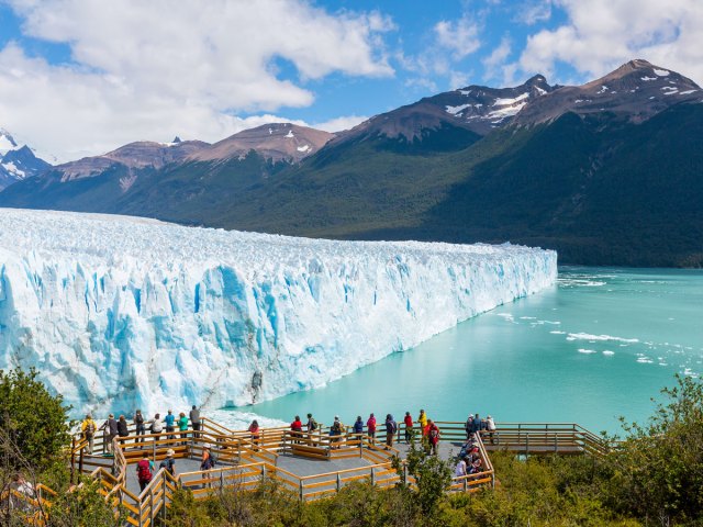 People on viewing platform overlooking Perito Merino Glacier in Argentina, seen from above