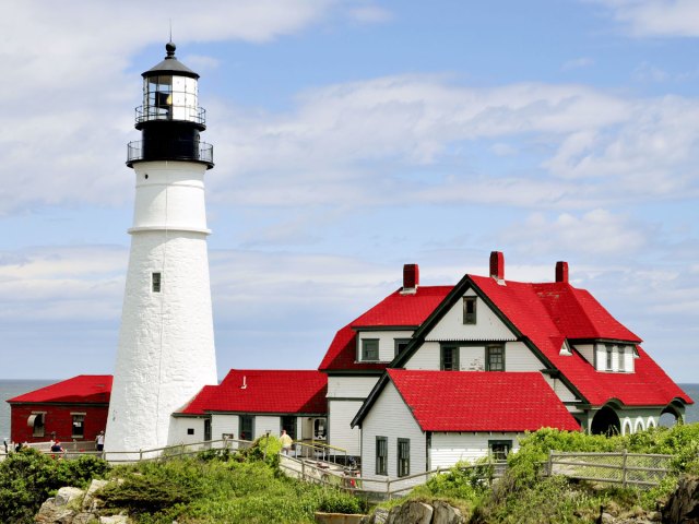 Portland Head Light and surrounding buildings on the coast of Maine