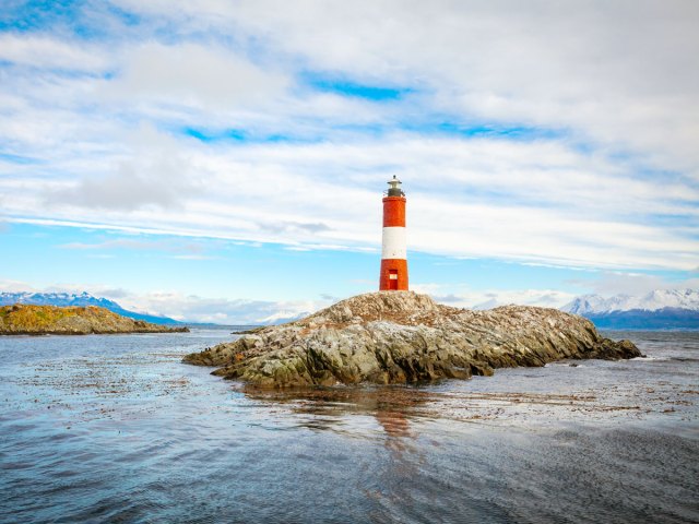 Les Eclaireurs Lighthouse on small rocky islet off the coast of Ushuaia, Argentina