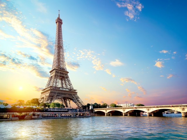 View of Eiffel Tower along Seine River in Paris, France
