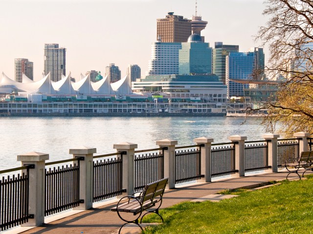 Benches in Stanley Park overlooking the sea and Vancouver, British Columbia, skyline