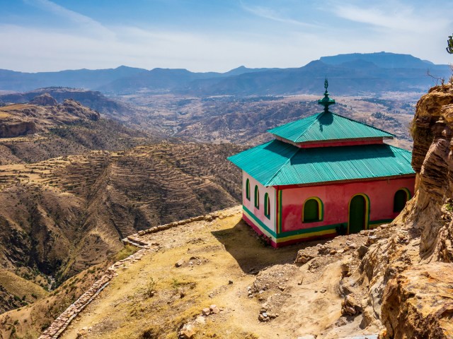 Brightly painted Debre Damo monastery overlooking mountains in southern Ethiopia