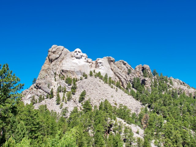 View of the giant carved presidential faces of Mount Rushmore in the Black Hills of South Dakota